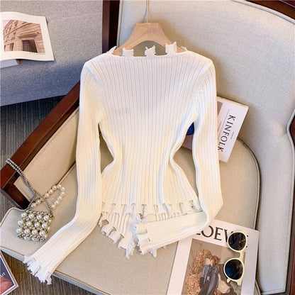 2023 new autumn and winter sweet and spicy style irregular v-neck ripped raw edge solid color slim sweater sweater top