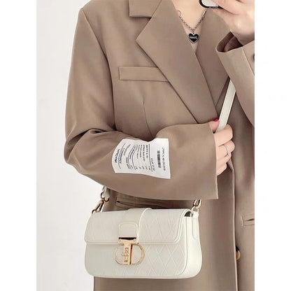 White bag women's summer 2023 new French niche designer underarm baguette bag high-end one-shoulder Messenger bag