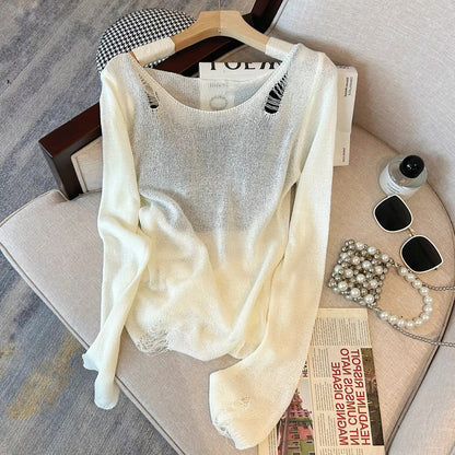 Hollow holed pullover sweater for women early autumn new French thin sun protection sweater lazy long-sleeved top to reduce age