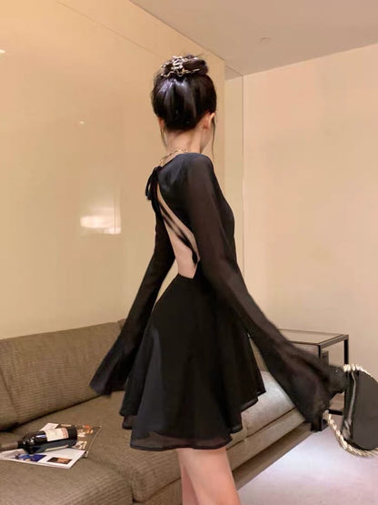 French Spice Girl Temperament Senior Sexy Backless Long-sleeved Dress Female Summer Seaside Vacation Dress Little Black Dress