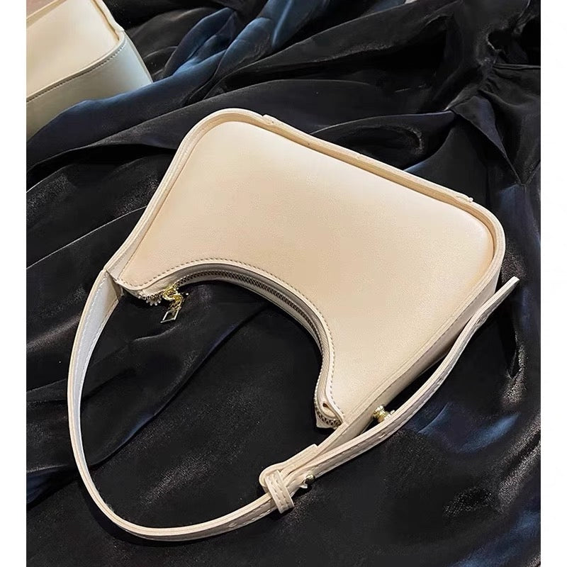 Bag women's 2023 new summer high-end texture niche versatile this year's popular French white one-shoulder armpit bag