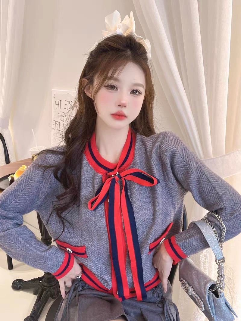 Long-sleeved knitted cardigan autumn and winter design niche contrast color soft waxy sweater women's 2023 new outer top