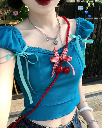 [Ten yuan off two pieces] "Sweet Dopamine" braided rope bow tie crop top with free cherry brooch