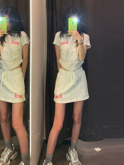 Student hot girl casual sports suit female summer short slim short-sleeved T-shirt short skirt OOTD two-piece set