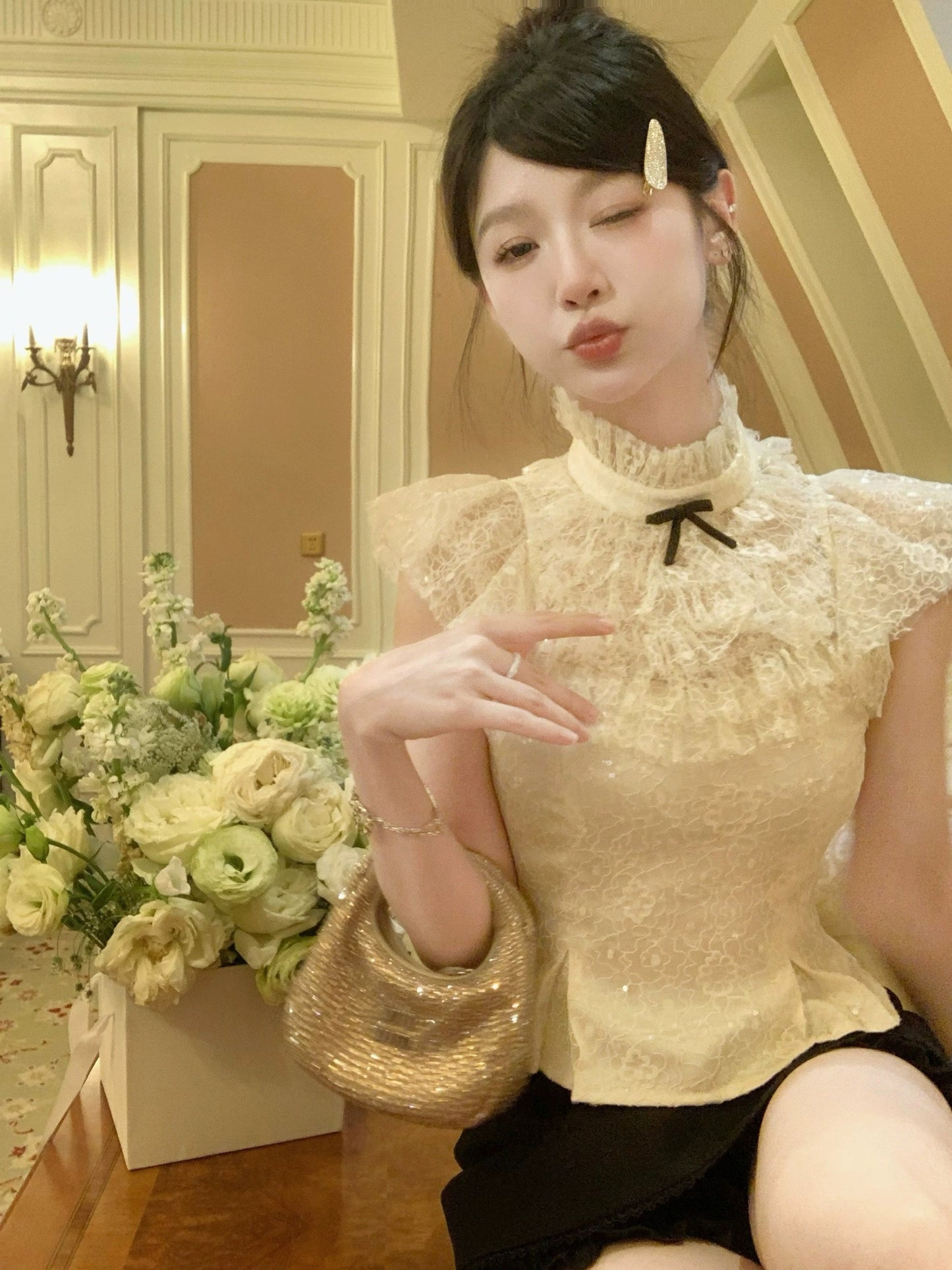 Ms. Weiss' "Bing Jiao" exquisite girly heavy-duty multi-layered lace sequin bow top with small flying sleeves shirt