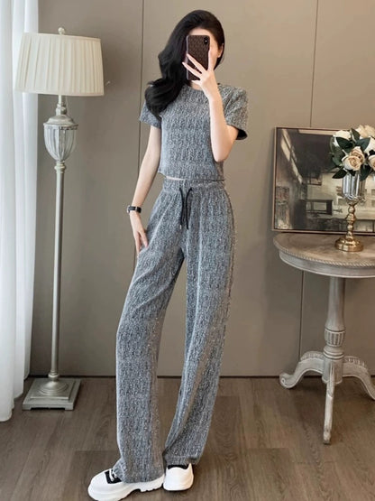 2024 Sports Suit Women's Summer European Hot Style Fashionable Slim Design Leaky Waist Top Wide Leg Pants Two-piece Set