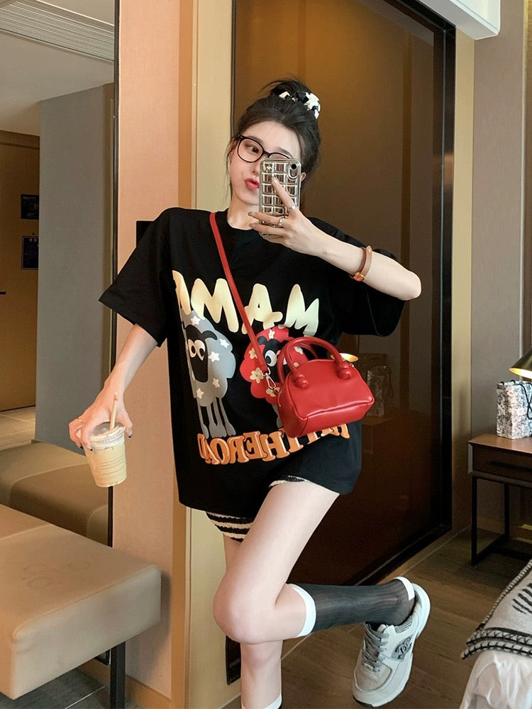 Black short-sleeved t-shirt women 2023 summer loose cotton design sense niche cartoon age reduction all-match half-sleeved top