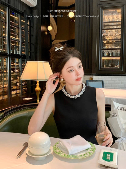 Yang Xiaojuan French handmade pearl collar Hepburn style dress female waist sleeveless little black dress summer high-end socialite