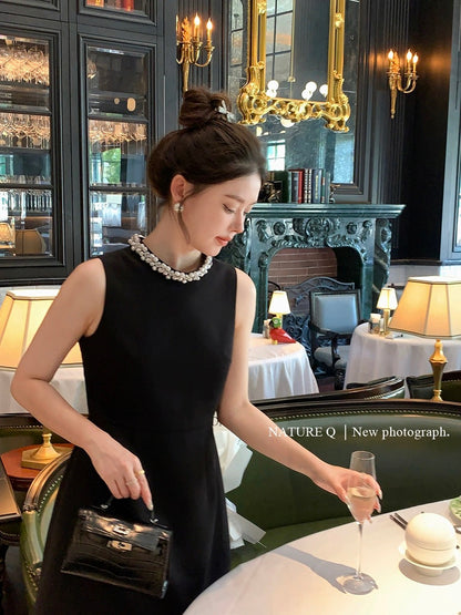 Yang Xiaojuan French handmade pearl collar Hepburn style dress female waist sleeveless little black dress summer high-end socialite