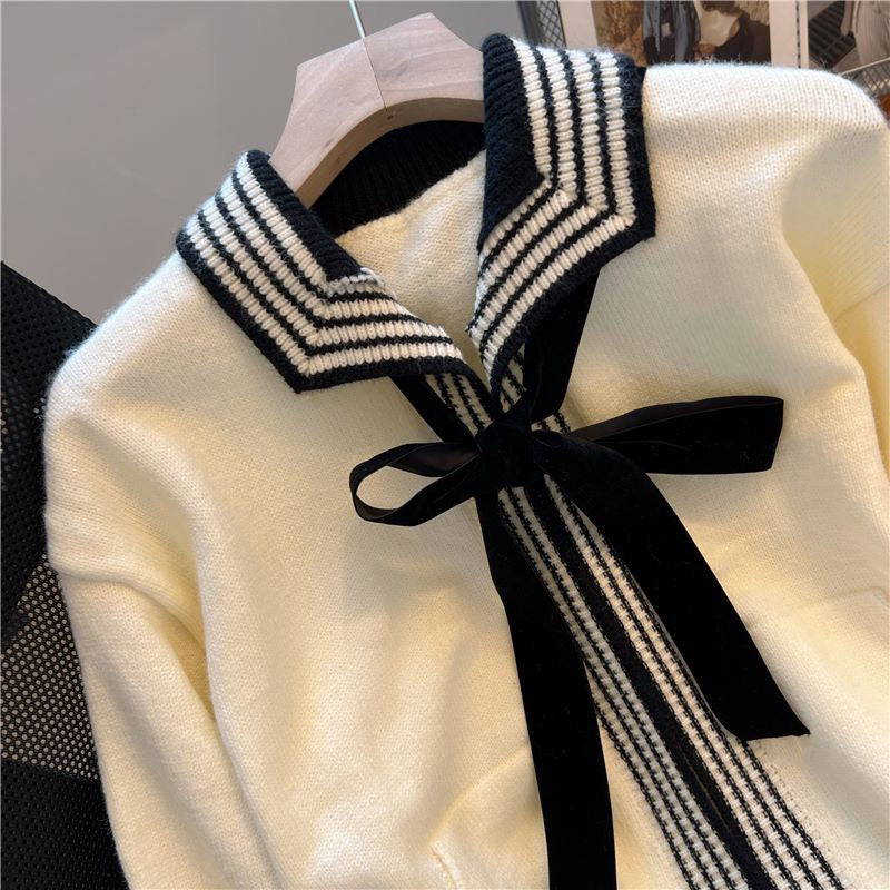 Early autumn new French preppy bowknot color matching lapel knitted cardigan women's lazy loose age-reducing top tide