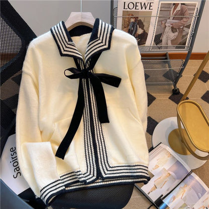 Early autumn new French preppy bowknot color matching lapel knitted cardigan women's lazy loose age-reducing top tide