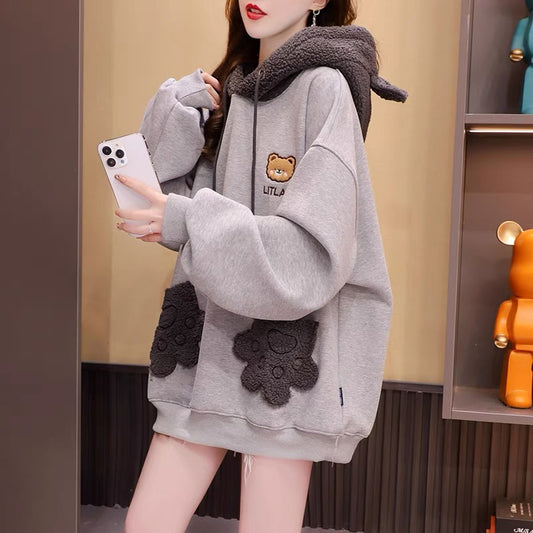 Fleece and thickened hooded sweater women's 2022 new autumn and winter hot style fashion western style age-reducing loose design coat