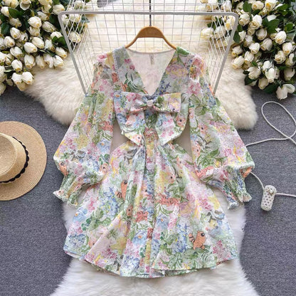 Gentle wind fairy French temperament V-neck bow age reduction printed lantern sleeves floral A-word fluffy dress female