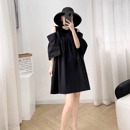 2022 new women's summer solid color fashion design sense mid-length dress women's loose and thin drop-shoulder little black dress