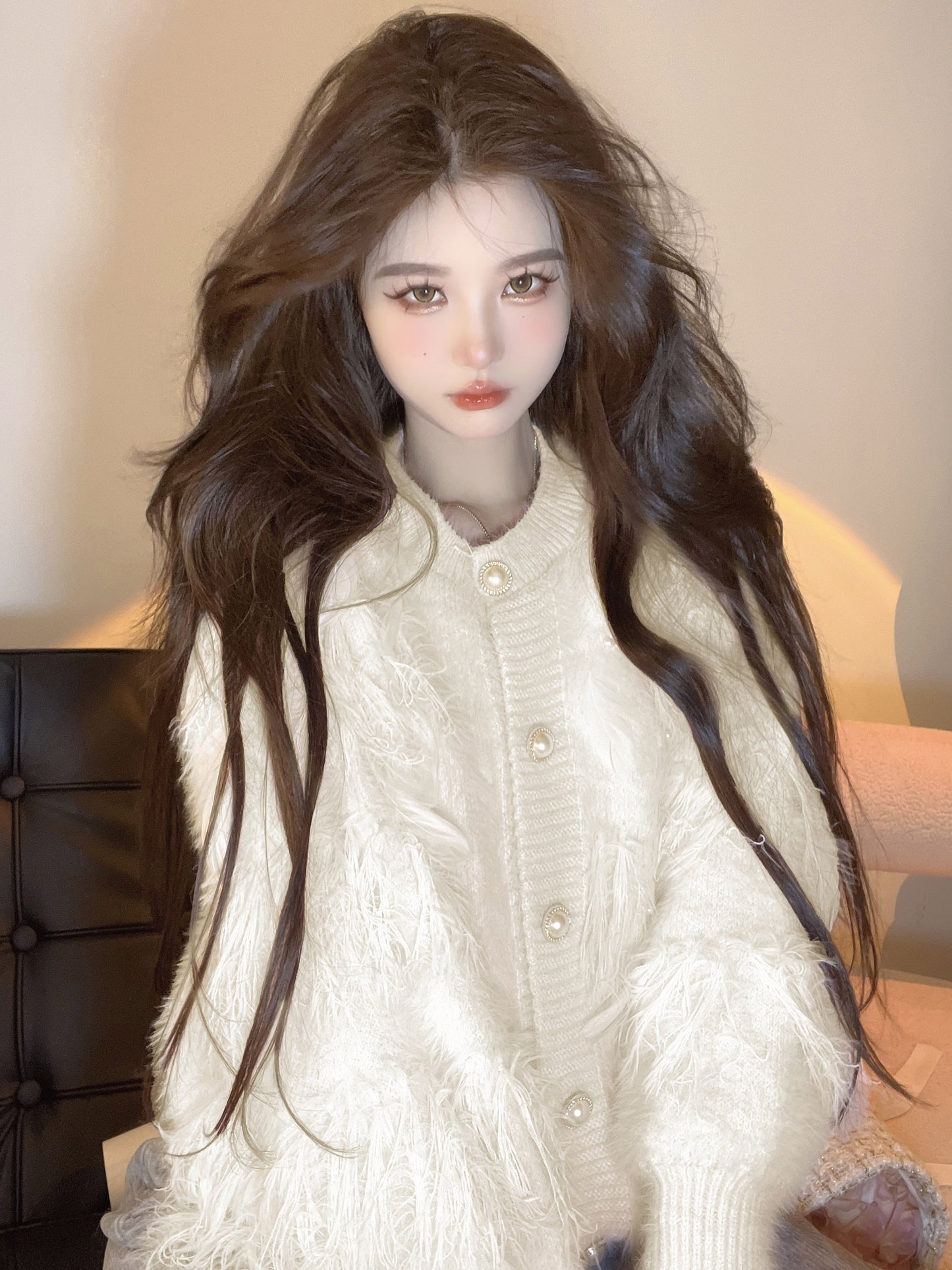 Kumikumi design sense heavy industry feather tassel knitted cardigan female autumn temperament loose round neck sweater jacket