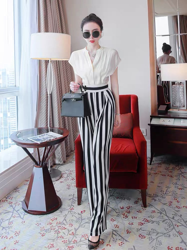 Design sense niche suit summer girl 2022 new ladies Western style short-sleeved top striped pants fashion two-piece suit