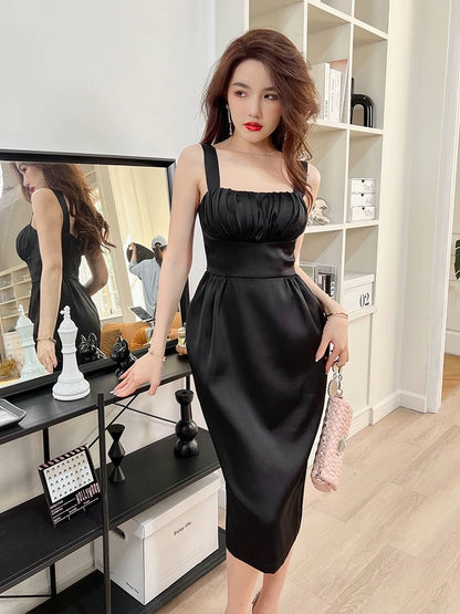 European station black chic Hepburn style bag hip suspender skirt new temperament light luxury waist slim dress summer