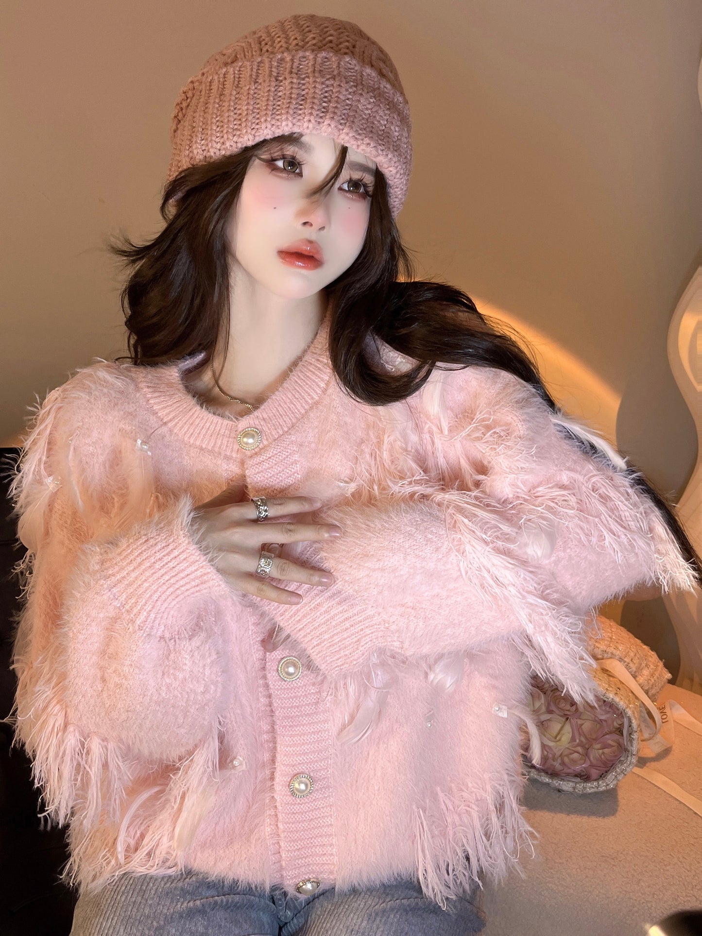 Kumikumi design sense heavy industry feather tassel knitted cardigan female autumn temperament loose round neck sweater jacket