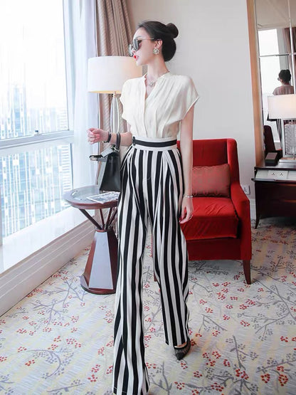 Design sense niche suit summer girl 2022 new ladies Western style short-sleeved top striped pants fashion two-piece suit