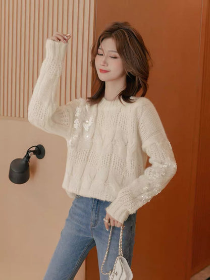 Small grain round neck knitted sweater women's 2022 autumn new loose and thin design sense niche top ins trend