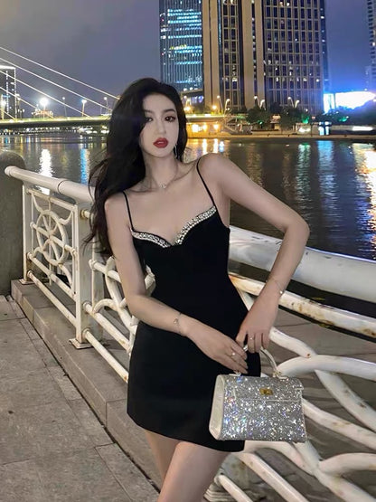 Sexy backless suspender dress women's summer chic high-end niche design waist Hepburn style little black dress