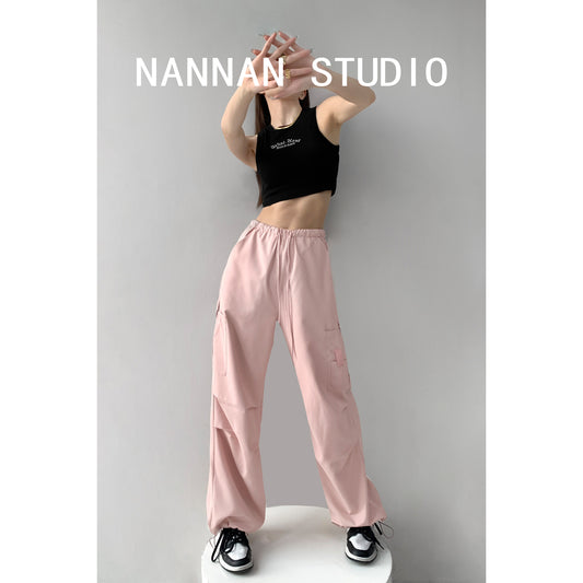 Sweet cool spring and autumn hot girl pink pleated low-waist overalls women's splicing pockets adjustable drawstring sports pants